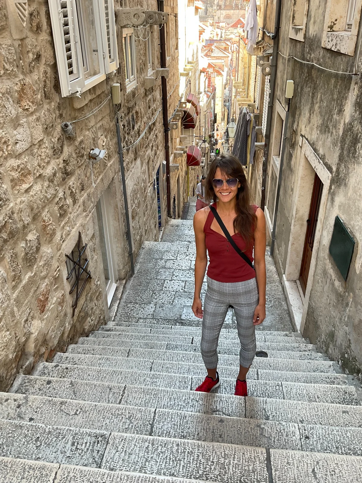 Rozzebud exploring a stone staircase while travelling